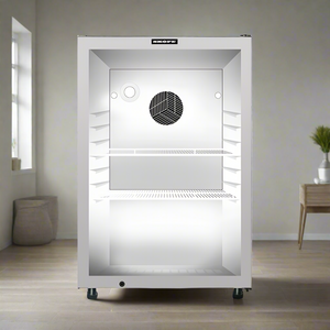 Stainless steel refrigerator with glass door on a white background