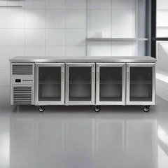 Commercial refrigerator with four glass doors on a white background