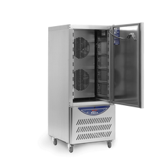 Commercial freezer with open door on a white background