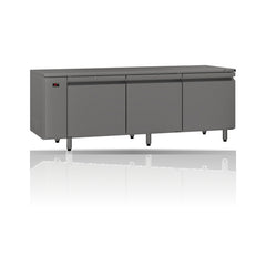 Williams Emerald - 3 door Stainless Steel Remote Under Counter Refrigerator on a crisp white background with mirrored reflection